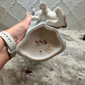 NAO Lladro Girl with dog and clock.